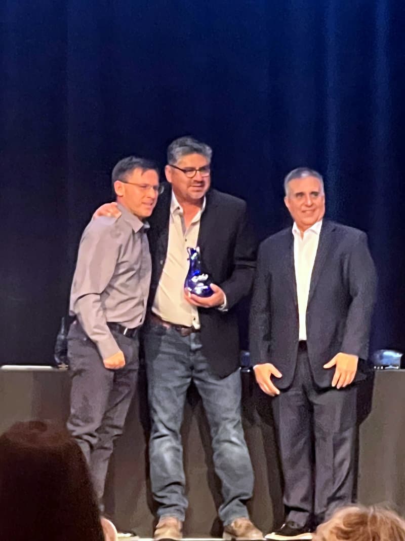 Javier Payan accepting the award